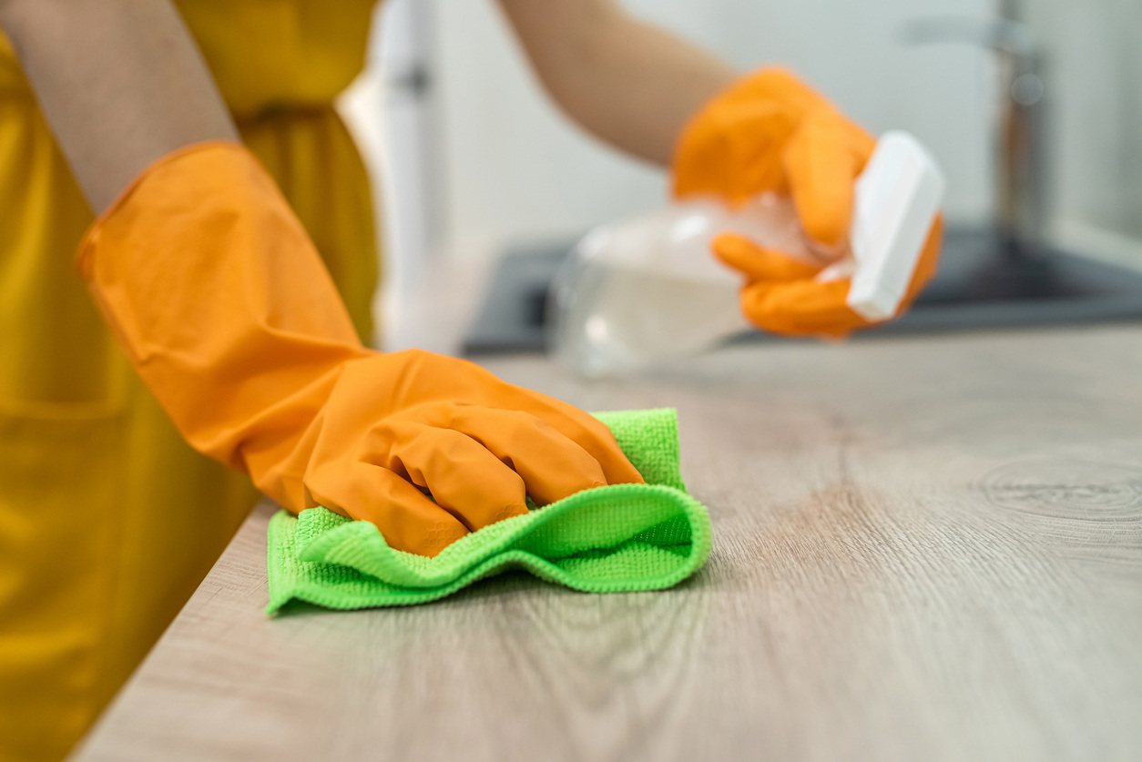 Closeup of the hands of an employee of a commercial cleaning company in charlotte nc